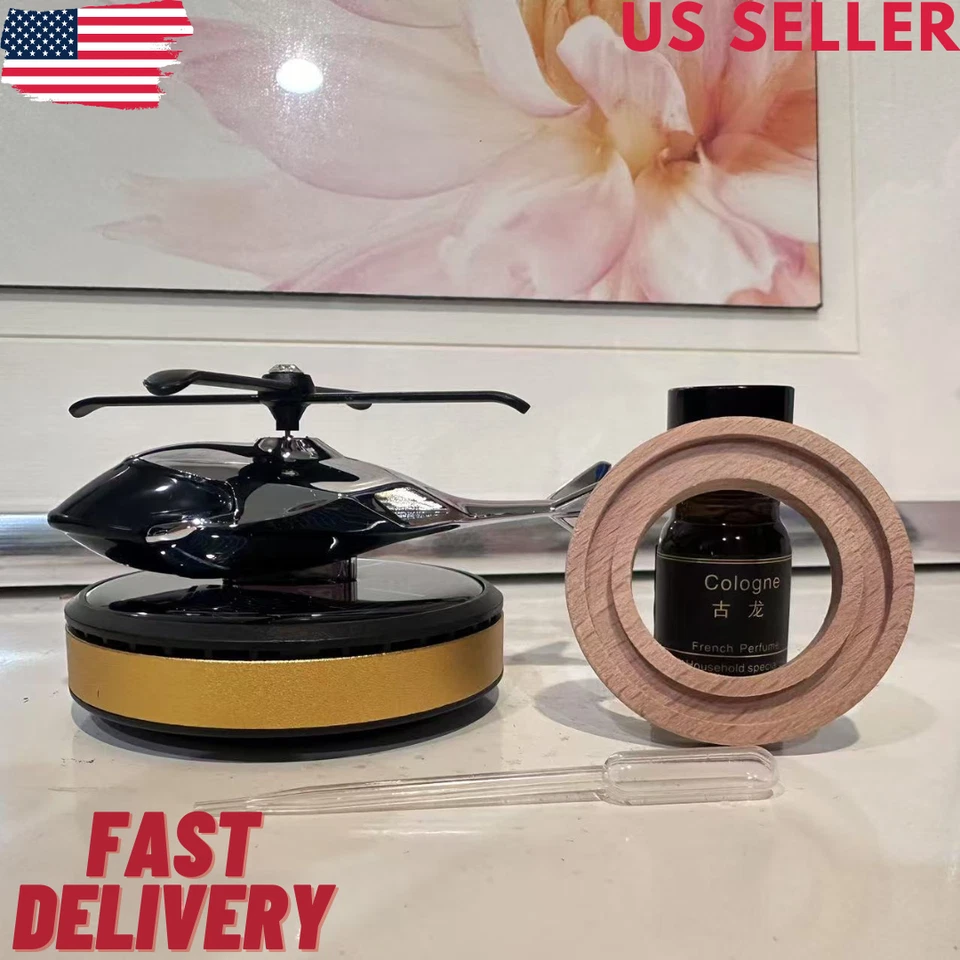 Ambientador de aire para automóvil difusor de aromaterapia giratorio de energía solar en forma de helicóptero Foto 1 de 4