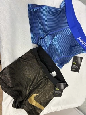 Shorts de treino Nike Pro Dri-FIT feminino conjunto M de 2 novo com etiquetas preto/dourado e azul - Imagem 1 de 4