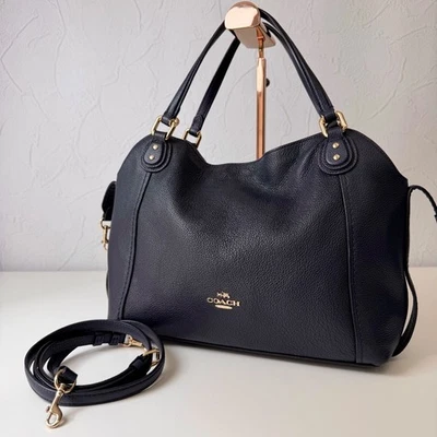 Bolso de hombro Coach Edie Hobo de cuero azul marino con correa ajustable Foto 1 de 4