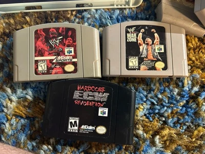 Lote de 3 Videojuegos de Lucha Nintendo 64 WWF Attitude, War Zone, ECW Hardcore Foto 1 de 2