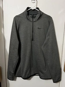 Suéter Nike Dri Fit 1/2 con cremallera de lana usado 1-2 para hombre Nike Dri Fit 1/2 con cremallera cuello simulado gris L - Imagen 1 de 8