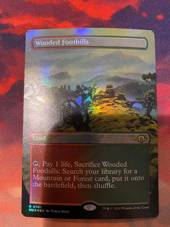 MTG Modern Horizons 3 Wooded Foothills Borderless Foil - Image 1 of 1