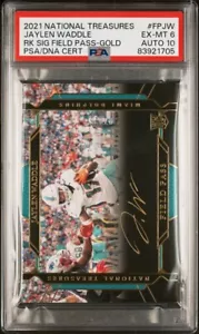 2021 National Treasures Jaylen Waddle RC Auto /25 Rookie Field Pass Gold PSA 6 - Picture 1 of 3