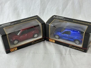 MAISTO  Superior Diecast Motorized Red and Blue PT Cruiser  Lot of 2 new in box - Picture 1 of 6