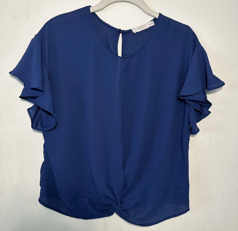 Blusa Top Azul Exuberante Clásica Semi Transparente Ligera Mangas con Pestañas Enrollables Foto 1 de 4