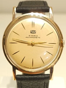VINTAGE RARE EARLY MEN'S GERMANY GOLD PLATED SLIM MECHANICAL WATCH"RUHLA" 15J. - Picture 1 of 9
