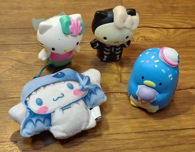 Esmoquin Hello Kitty Sanrio Sam Squishy, sirena de McDonalds, dragón blanco, esqueleto Foto 1 de 4