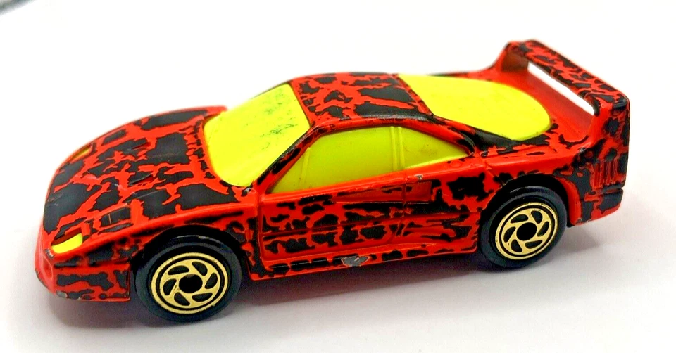 Matchbox # 24 1988 naranja amarillo neón camuflaje salpicaduras Ferrari F40 1:59 Foto 1 de 4