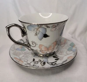 Vintage Teacup & Saucer, White, Silver Mirrored Accents, Multi-color Butterflies - Picture 1 of 7