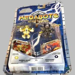 Vintage Neu in Verpackung Hasbro kartoniert 2er-Pack MEDABOTS Sumilidon vs. Rokusho Actionfiguren - Bild 1 von 17