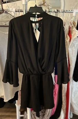 Mameluco corto negro con bolsillos talla mediana marca es BCX Foto 1 de 4