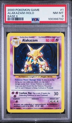 2000 Pokemon Base Set 2 Alakazam #1 - English Holo 1/130 - PSA 8 NM-MT - Image 1 of 4