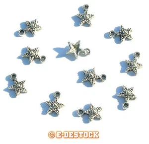 8 Anhänger Stern aus Metall 14 x 8 mm - versilbert gealtert - Bild 1 von 1