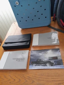 D40 NISSAN NAVARA (2010 - 2015) OWNERS MANUAL HANDBOOK & WALLET - Picture 1 of 10