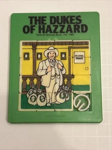 Vintage 1981 Dukes of Hazzard Green Boss JD Hogg Schiebepuzzle Spielzeug Spiel Warner - Bild 1 von 11