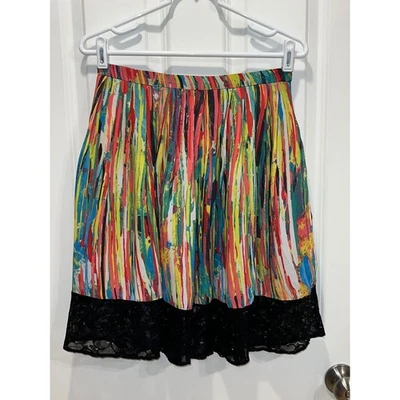 Falda plisada Prabal Gurung para mujer 10 negra con ribete de encaje estampado colorido Foto 1 de 4