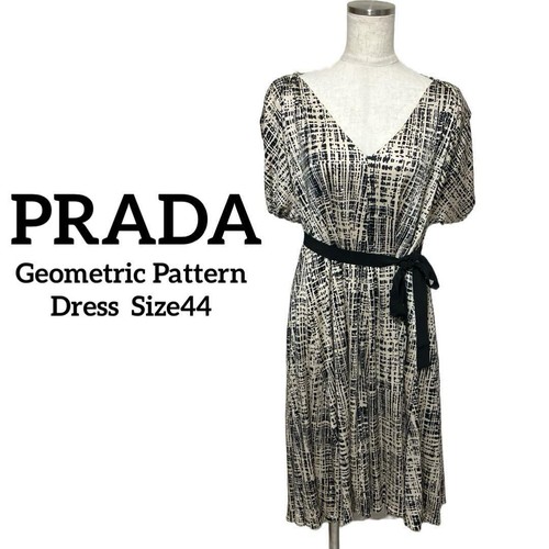 Abito Prada modello geometrico pezzo unico in avorio beige e nero taglia 44