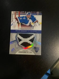 2020-21 Upper Deck SP Game Used Philipp Grubauer Net Cord Stadium Series /35 - Foto 1 di 2