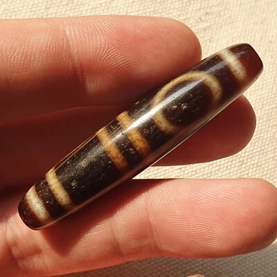 Tibetan Treasures Heaven and Earth Dzi Agate Bead Cinnabar/Blood Spots Amulet - Image 1 of 4