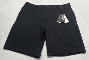 Pantaloncini corti uomo Rhone Commuter taglia 36 9" cuciture interne neri nuovi con etichette - Foto 1 di 11