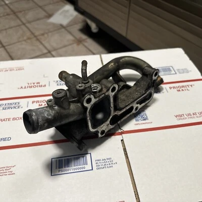 Used 01-03 Honda Civic Thermostat housing passage coolant outlet. Non EGR type - Image 1 of 4