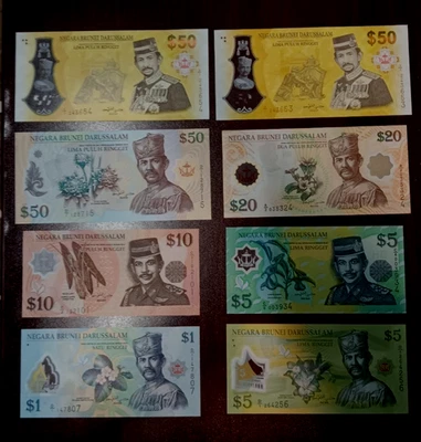 Lote de 9 billetes UNC de Brunei y Singapur - altas denominaciones y polímero Foto 1 de 4