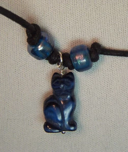 Navy blue cat pendant on neck thong - Picture 1 of 1