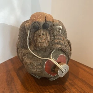 Carved Monkey Coconut Shell Figurine - Doctor with stethoscope checking heart  - Picture 1 of 10