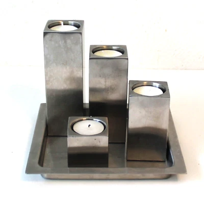 Juego de 4 Candelabros Gradientes Pilar Candelabro Plata Metal BLOMUS Alemania Foto 1 de 4