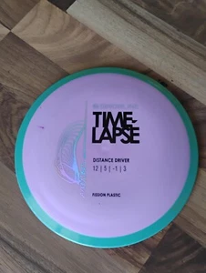Axiom Disc Golf Simon Lizotte Line Fission Time Lapse Driver 175 G Purple/Teal - Picture 1 of 7
