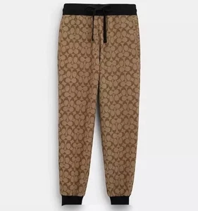 Pantalones de chándal Coach Signature para dama talla grande - Imagen 1 de 7