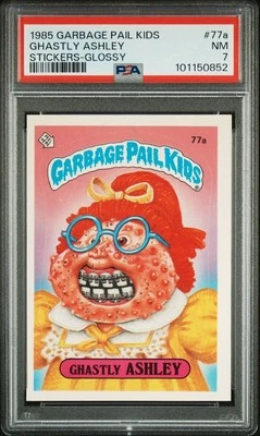 PSA 7 NM 1985 Garbage Pail Kid #77a GHASTLY ASHLEY STICKER CARD GLOSSY - Image 1 of 2