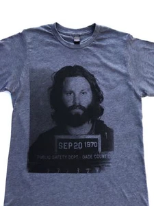 JIM MORRISON MUGSHOT TEE $25 SIZES S-3XL FREE SHIP ROCK MUSIC OUTLAW NEW T-SHIRT - Picture 1 of 2