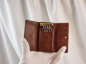 Original Louis Vuitton Schlüsseletui 4 Ring Haken Multicles braun Monogramm LV - Bild 1 von 24