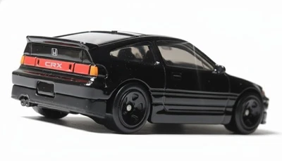 Coche fundido a presión negro Mattel Hot Wheels - Honda 1988 - cupé CRX 1988 - 1:64 Foto 1 de 2