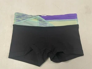 LULULEMON IVIVVA  BLACK   STRETCHY BOOTY DANCE GYMNASTIC SHORTS GIRLS  SZ  7  - Picture 1 of 4