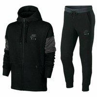 black nike fleece tracksuit