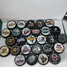 Lot of 27 Minor League Hockey Pucks
