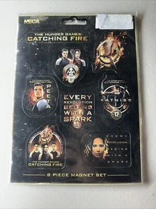 OFFICIAL THE HUNGER GAMES CATCHING FIRE 8 PIECE FRIDGE MAGNET SET By NECA NEW! - Picture 1 of 2