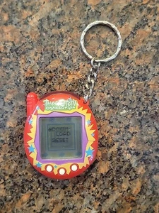 2004 BANDAI TAMAGOTCHI Connection v3 rot mit gelb blauen Sternen | getestet gut - Bild 1 von 6