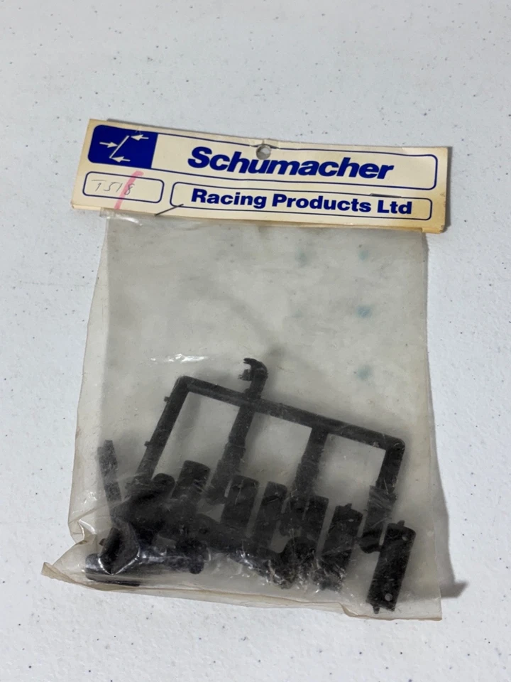 Schumacher T518 Vintage RC R/C Bracket Molding NEW NOS Cat XL XLS XL98 SWB 4WD - Image 1 of 1