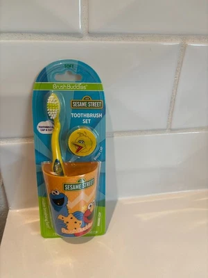 Juego de cepillos de dientes Plaza Sésamo 123 cepillo de dientes y taza cepillos amarillo Foto 1 de 2