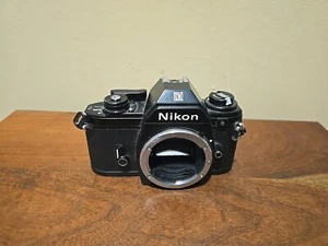 Nikon EM Black SLR 35mm Film Camera Body Only - Missing Battery Cover - Picture 1 of 11