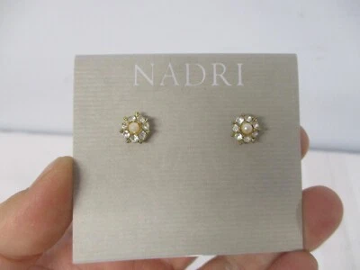 NEW NORDSTROM NADRI CRYSTAL FLOWER STUD EARRINGS ~ MINT ON CARD ~ 1/4" - Image 1 of 3