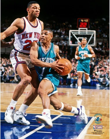 Muggsy Bogues Hornets Unsigned Teal Jersey Driving Towards Hoop vs Knicks Photo Cover