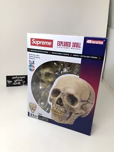Supreme Human Skull Modell 4D 21-teiliges Puzzle mit Goldgrills FW23 - Bild 1 von 12