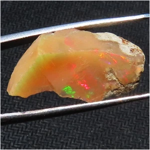 NATURAL PLAY OF COLOR ETHIOPIAN OPAL ROUGH GEMSTONE 7.45 Cts. (11x21x07 mm) P19 - Picture 1 of 7