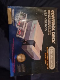Boxed Nintendo NES console and Mario/Duck Hunt Game