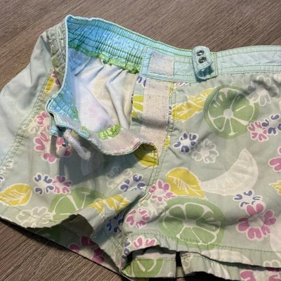 Bañador Lilly Pulitzer Niñas Board Shorts Talla 6X Estampado Floral Cítrico Foto 1 de 4