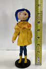 Coraline Statue with Yellow Jacket